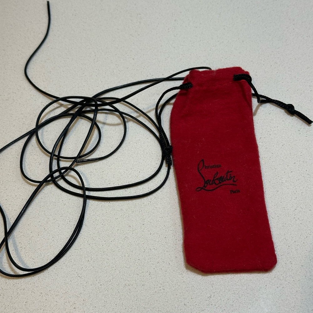 Christian Louboutin small Red Drawstring Bag and waxed shoelaces (laces are new)